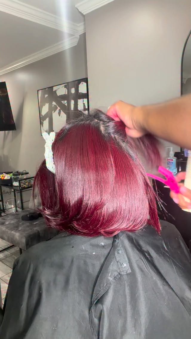 Precision haircut in progress at Hair by D