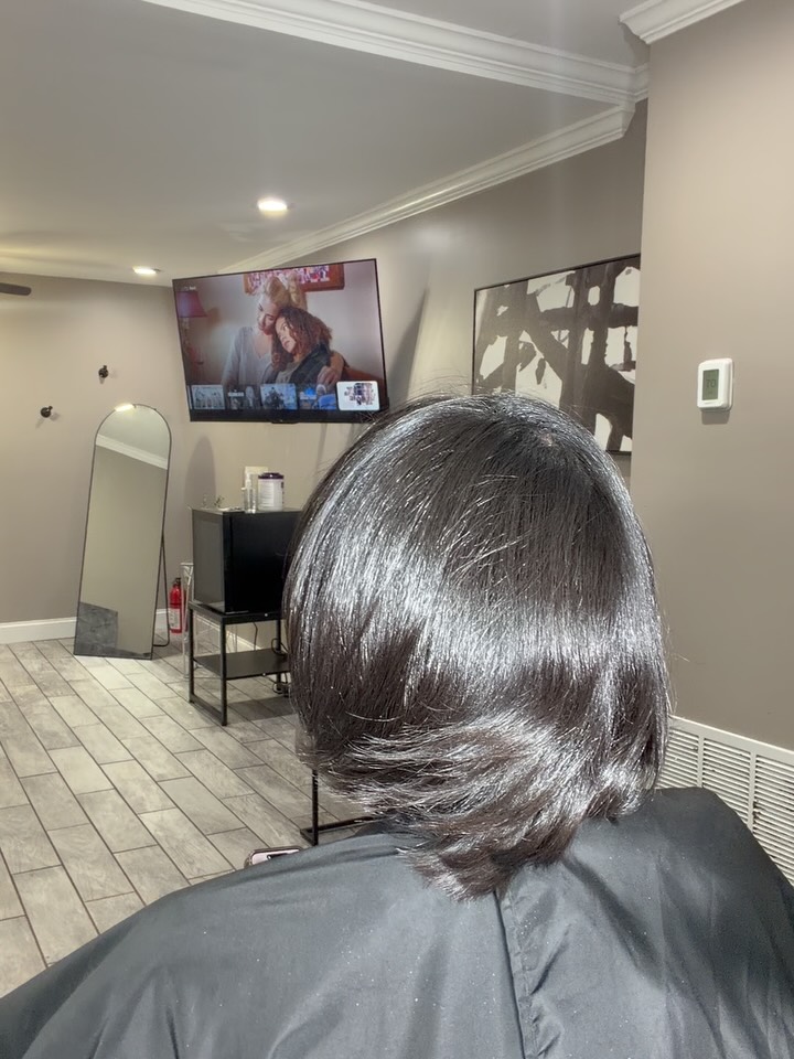 Sleek bob hairstyle by Hair by D